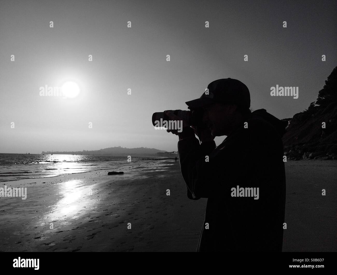 Photographer on the beach in Santa Barbara, California - Smartphone Captured Stock Image