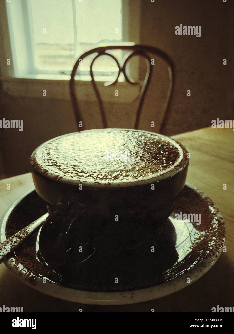 Table behind coffee drink in cafe - Smartphone Captured Stock Image