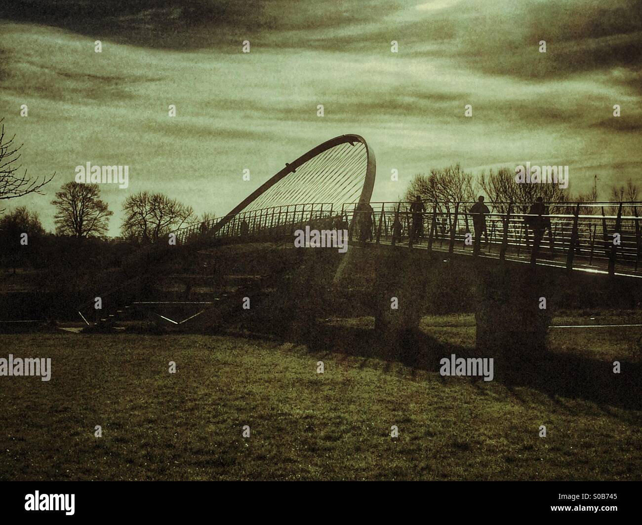 Bridge across a river on a Dark gloomy day - Smartphone Captured Stock Image