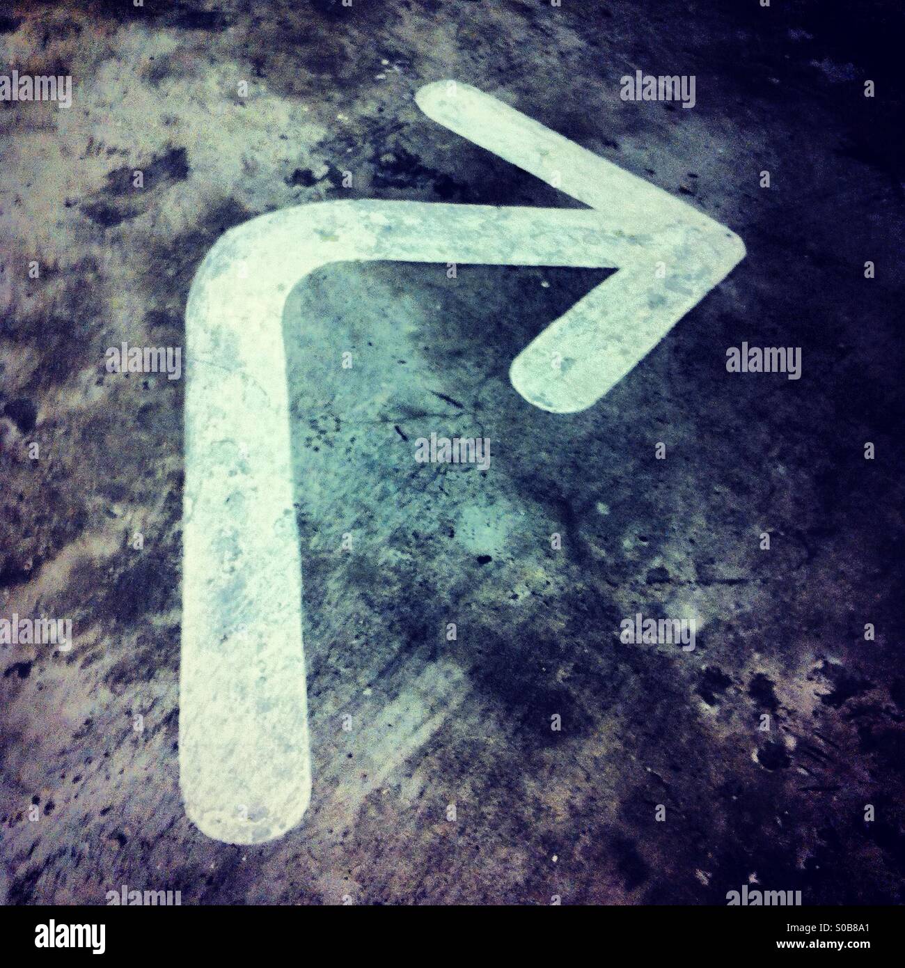 White arrow turning right - Smartphone Captured Stock Image