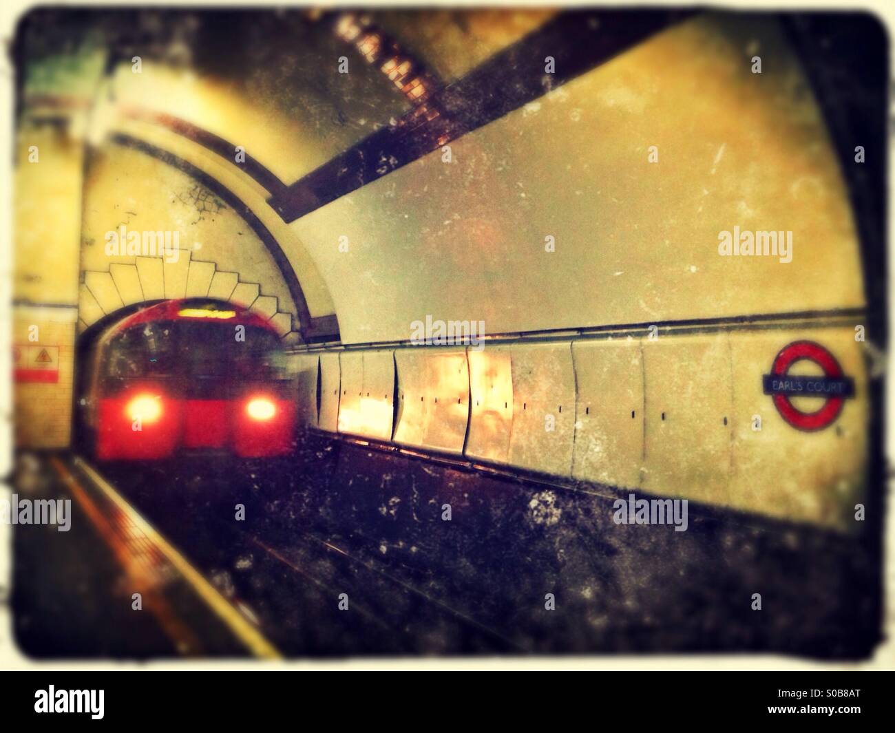 Tube train arriving at Earl's Court station, Royal Borough of