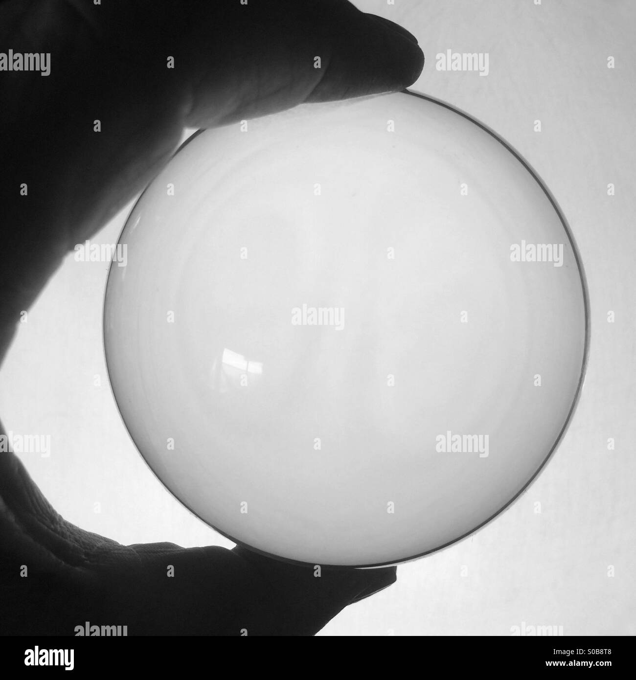 Holding crystal ball Stock Photo Alamy