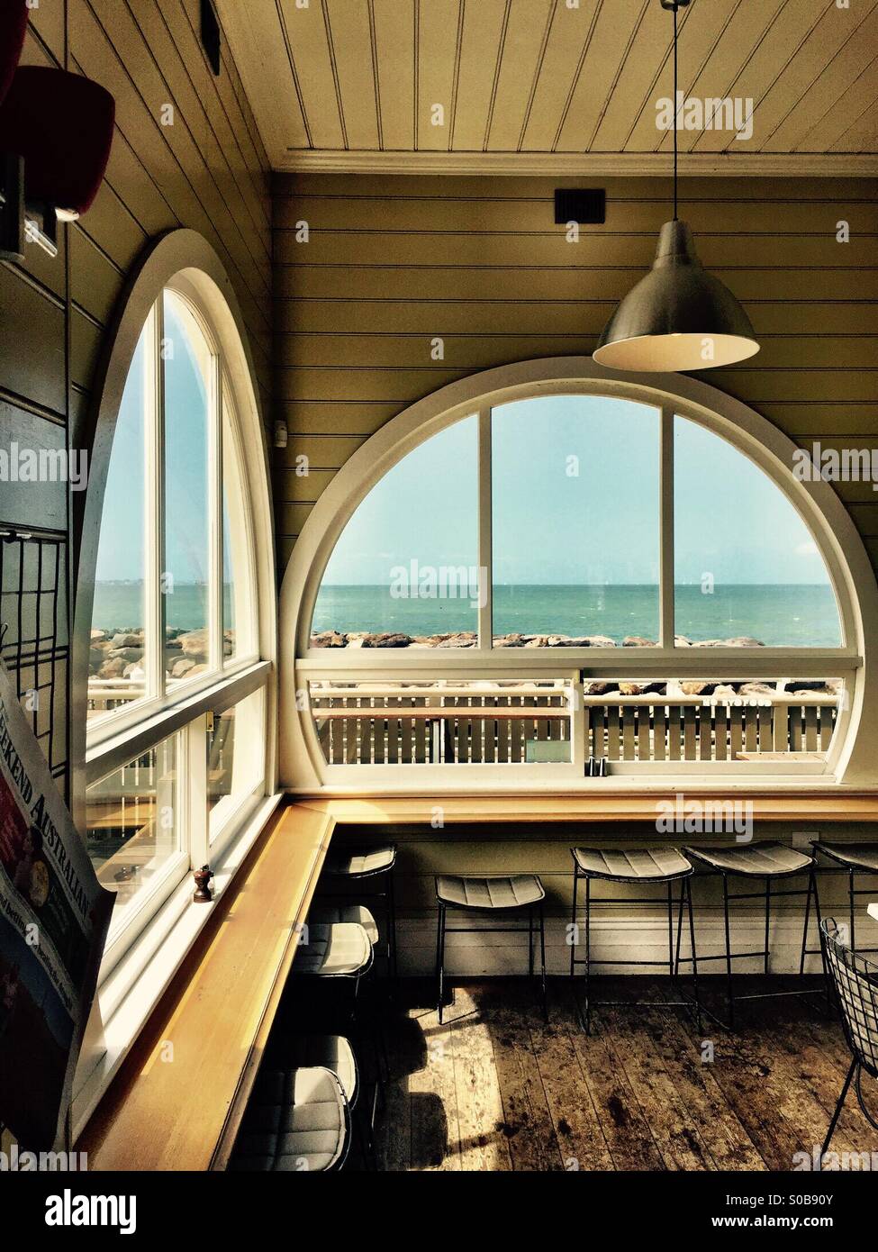 The cafe at St Kilda Pier, Melbourne showing it's amazing round windows Stock Photo