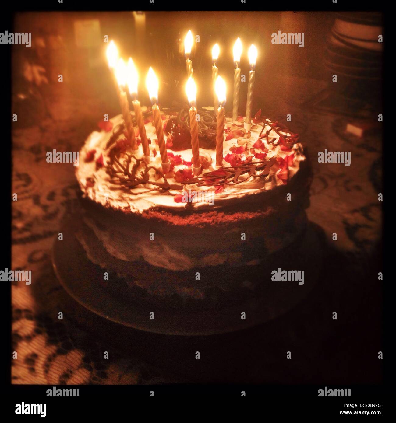 Chocolate birthday cake with candles - Smartphone Captured Stock Image