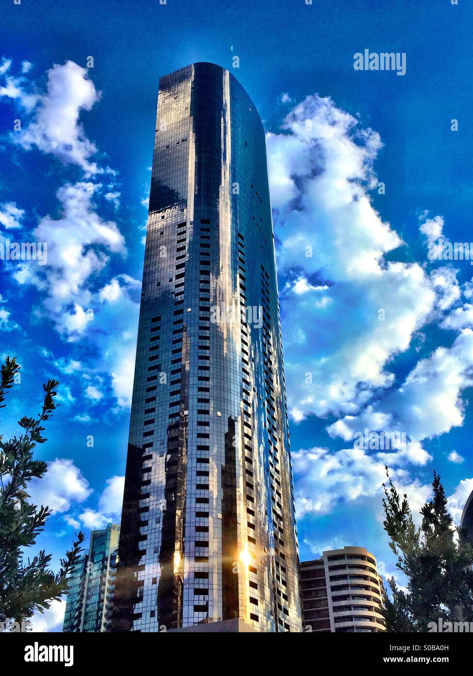 A silver skyscraper in Melbourne Australia - Smartphone Captured Stock Image A silver skyscraper in Melbourne Australia - Smartphone Captured Stock Image