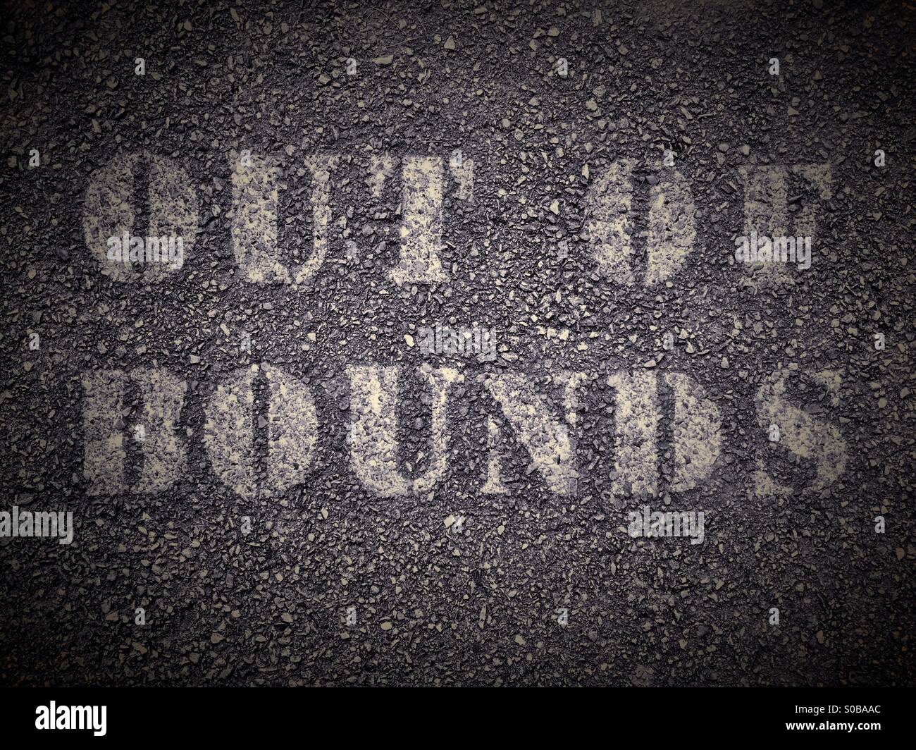 An 'out of bounds' sign on a pavement Stock Photo