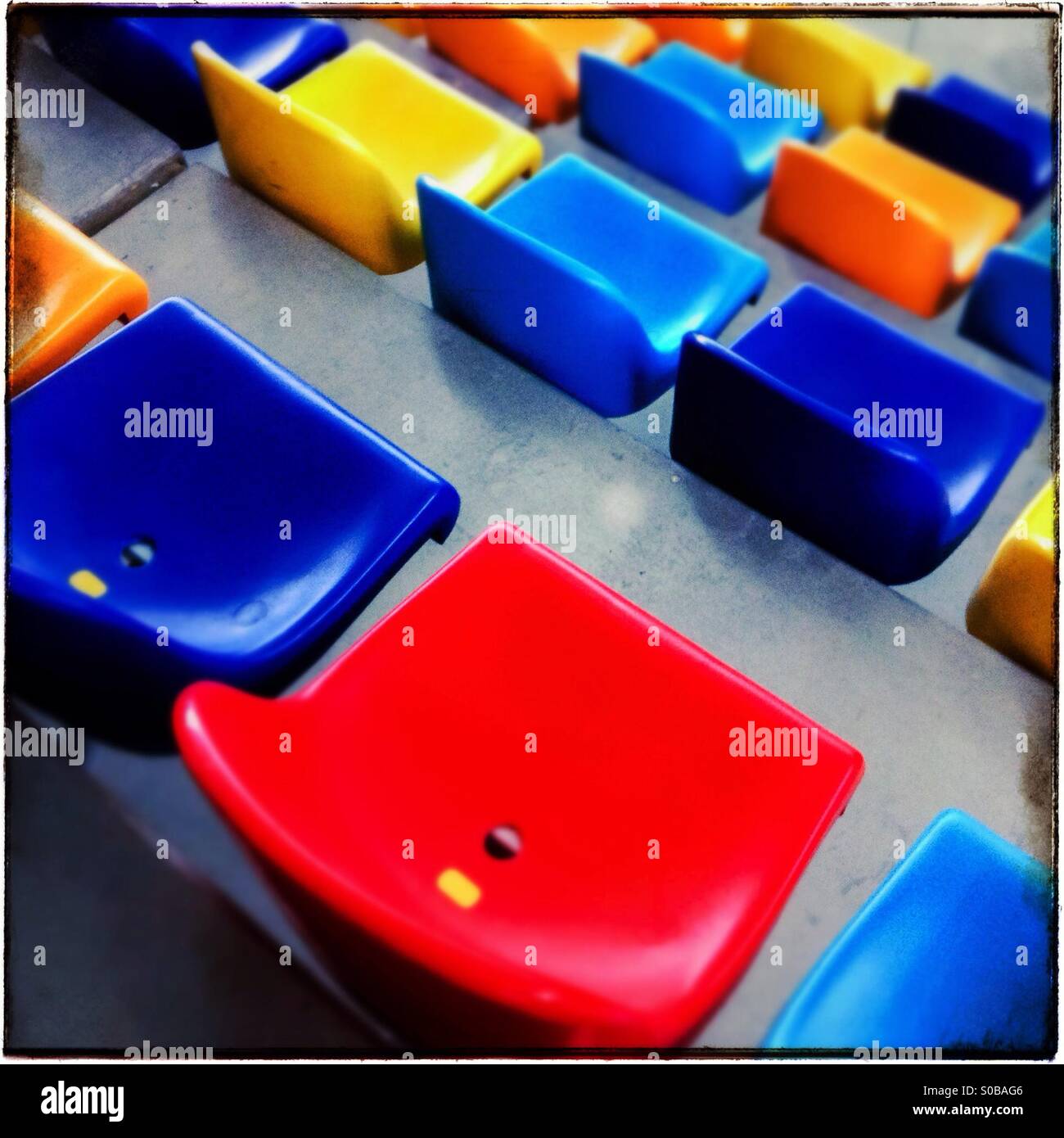 Colorful empty seats in a stadium - Smartphone Captured Stock Image