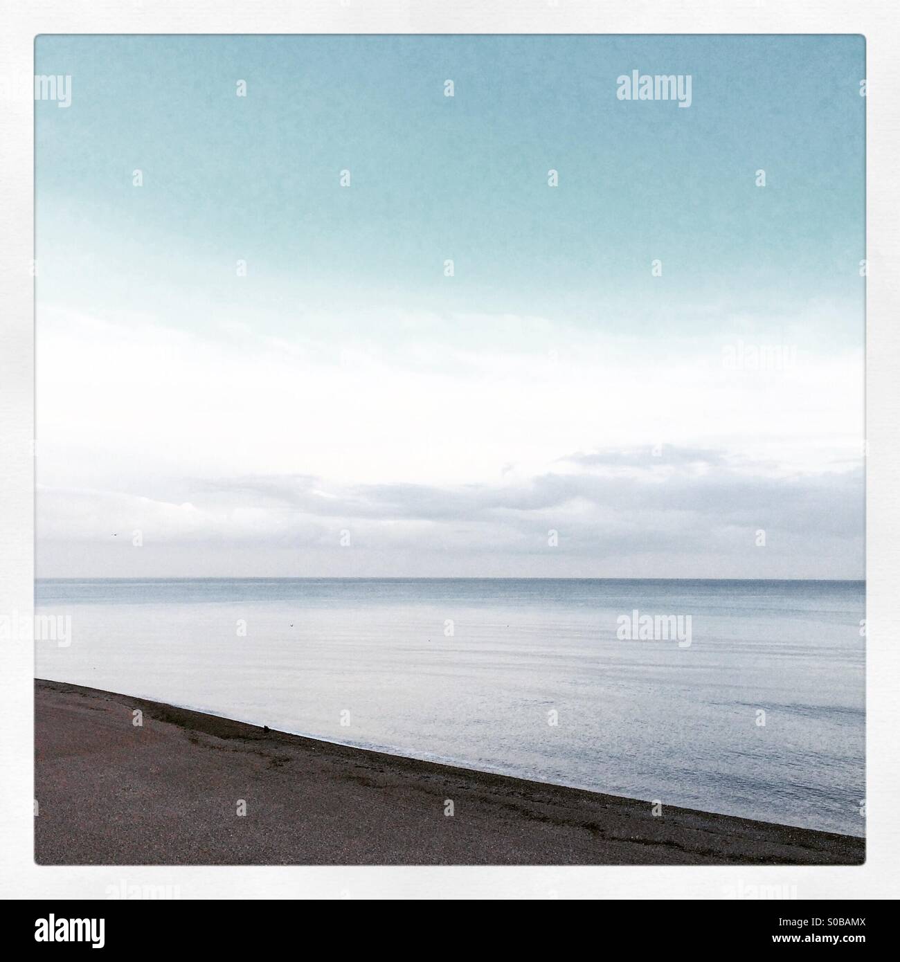 A calm silvery sea - Smartphone Captured Stock Image