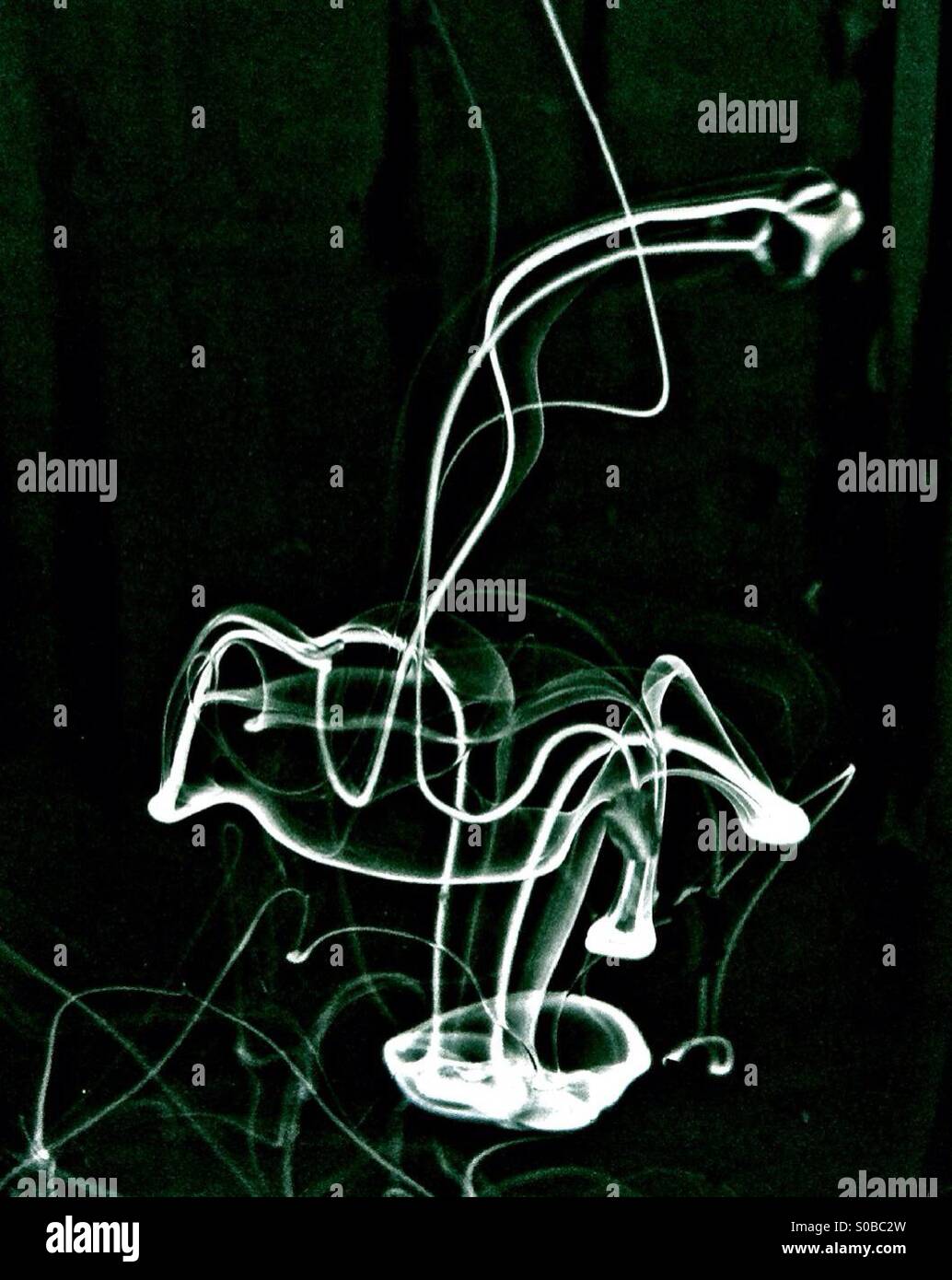 Colour inverted image of dye in water - Smartphone Captured Stock Image