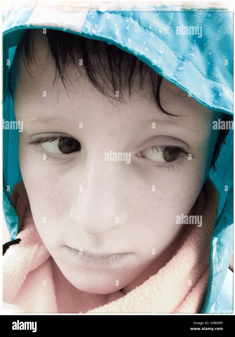 Portrait of a boy looking away Stock Photo - Alamy