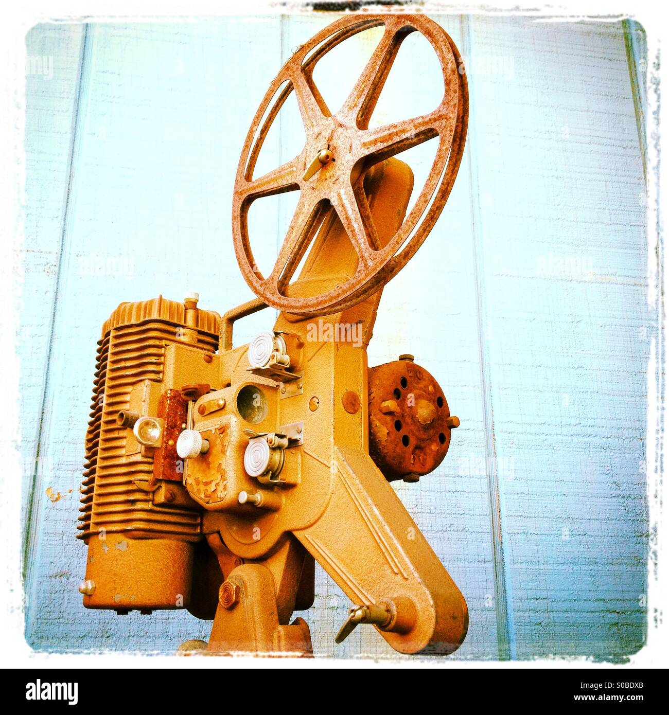 Angled view of Vintage 8 mm Movie Projector with Film Reels. Film is  threaded through Projector Stock Photo - Alamy