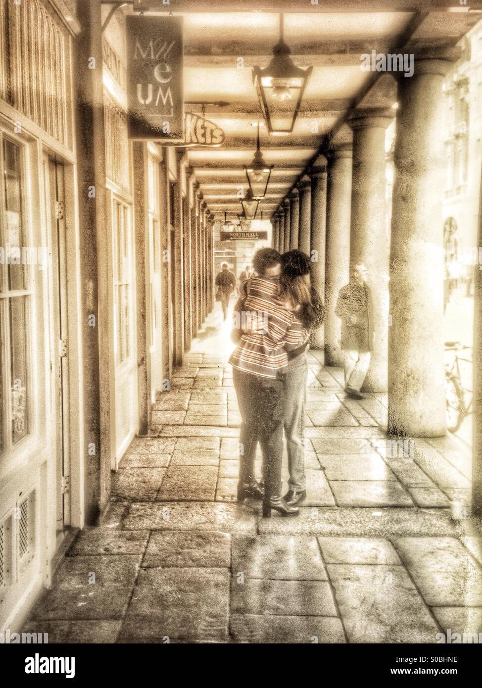 A couple embrace in Covent Garden Stock Photo