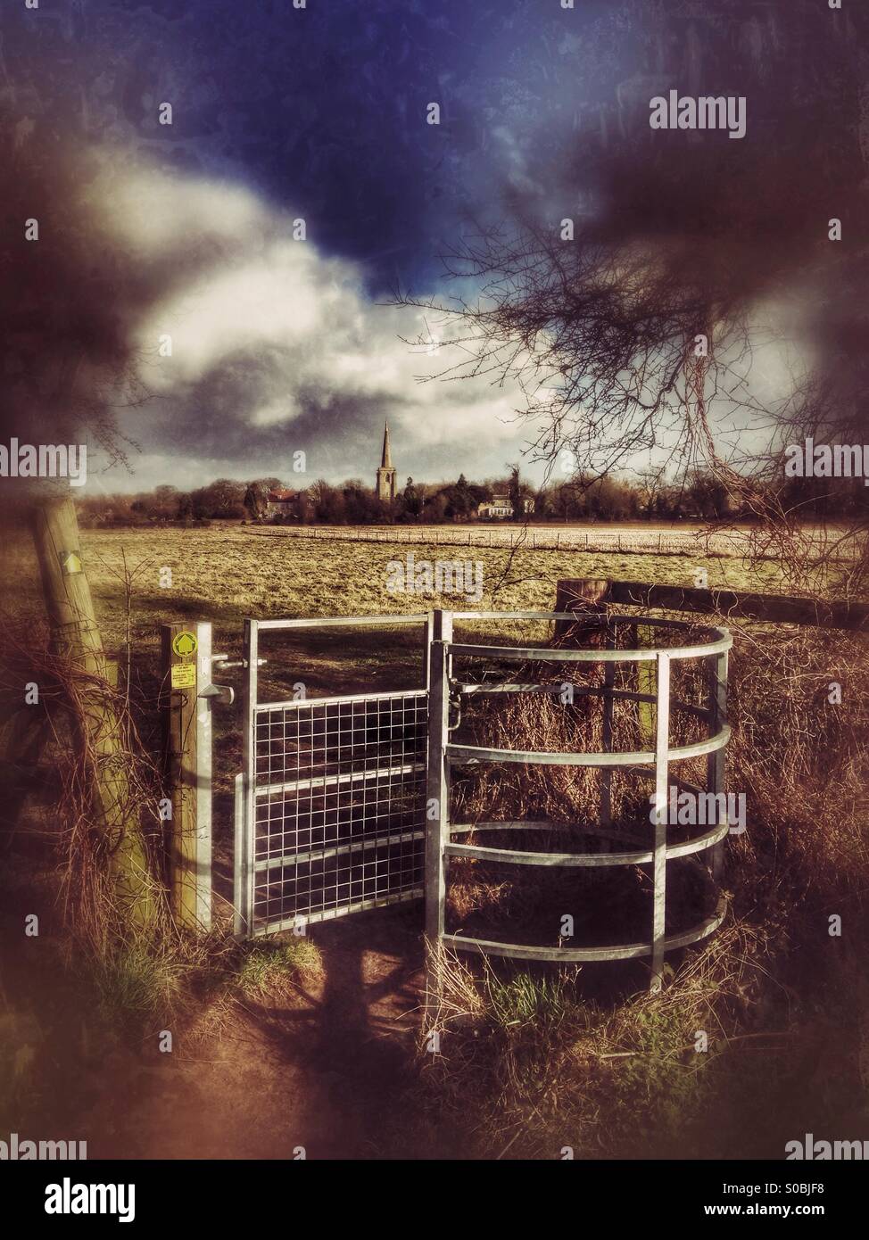 Kissing gate on rural footpath. Ancaster, Lincolnshire, England. - Smartphone Captured Stock Image