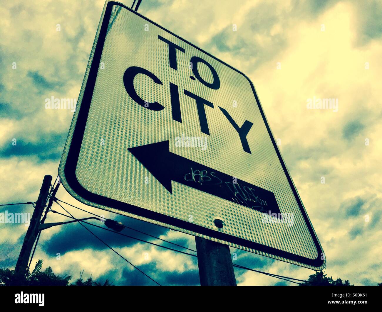 A sign that says 'To City' Stock Photo