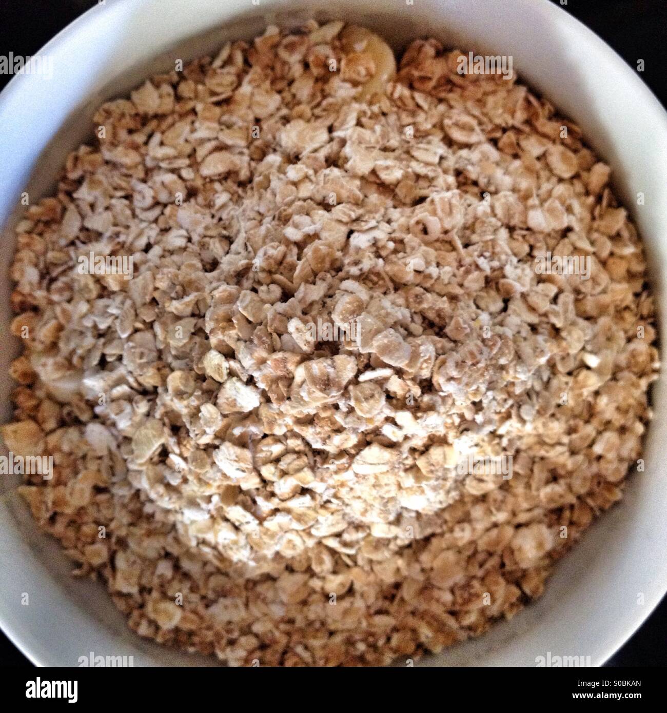Bowl of oats Stock Photo