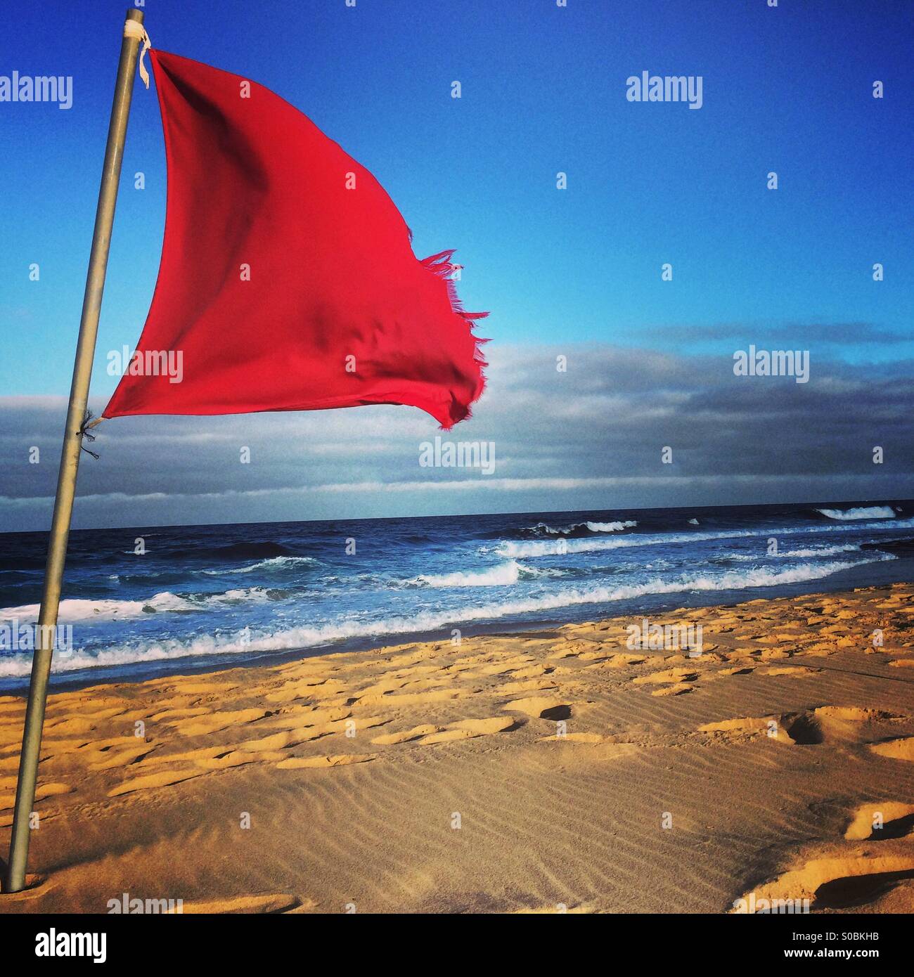 Red flag beach hires stock photography and images Alamy