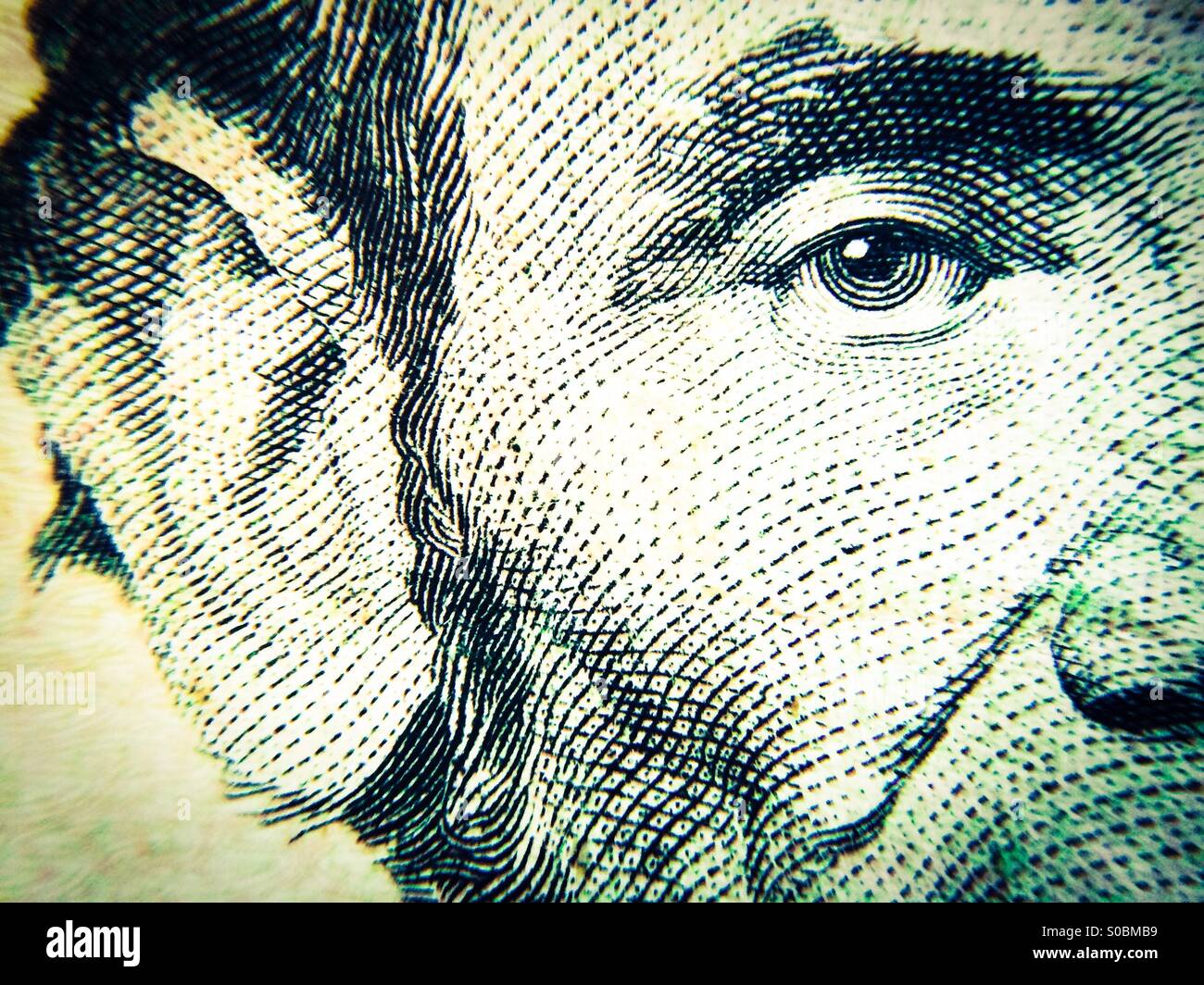 Macro view of President Abraham Lincoln on a five dollar bill Stock Photo