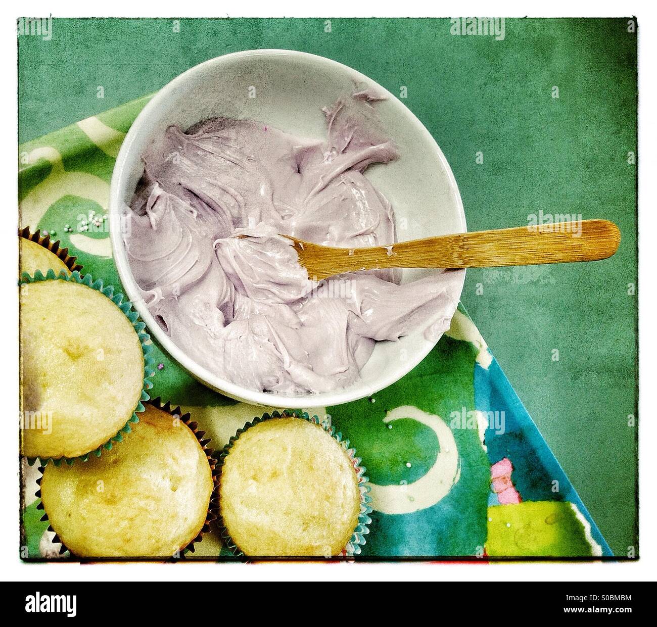 Cupcake making ingredients with frosting Stock Photo Alamy