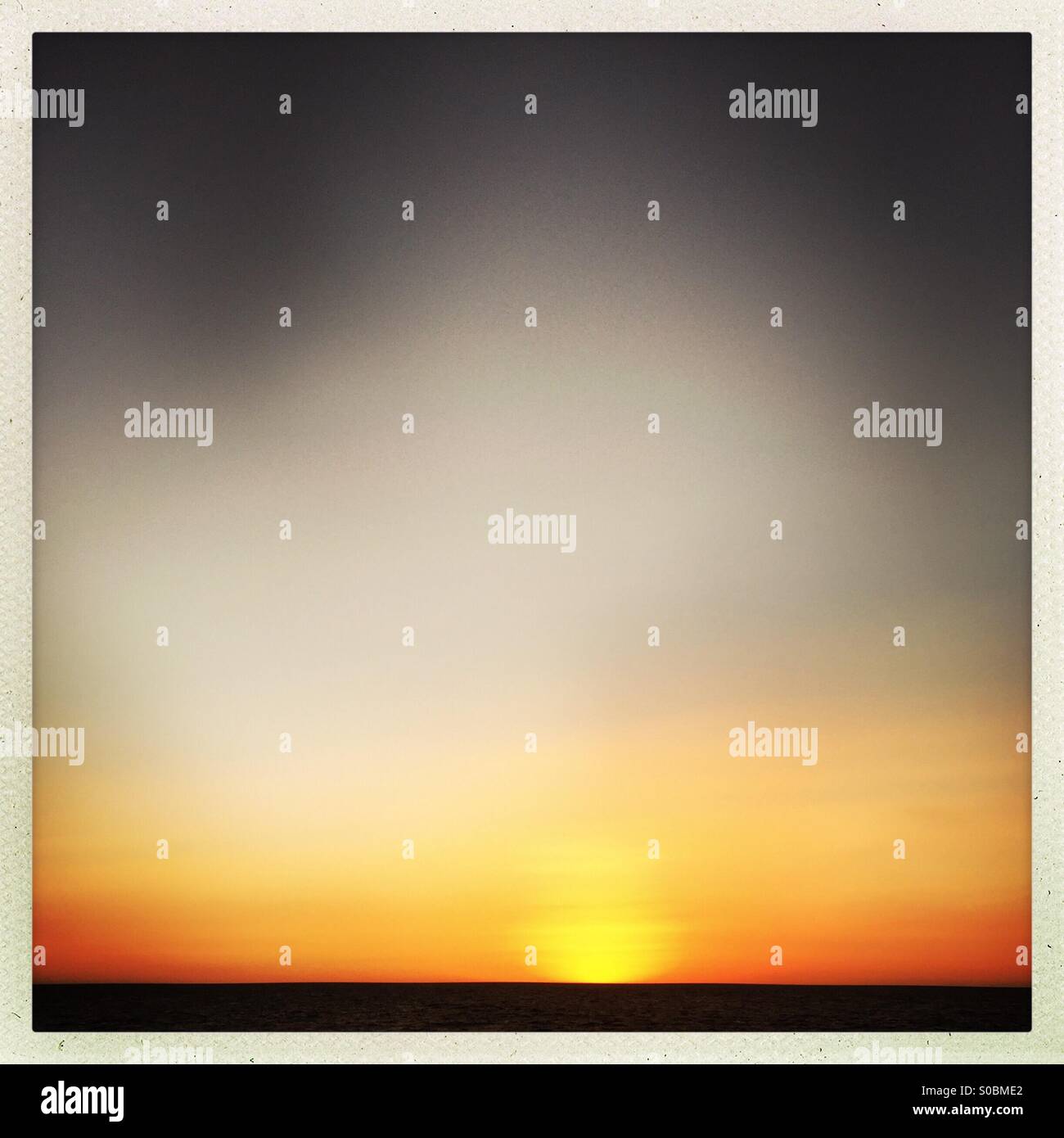 A sunset over the ocean. Manhattan beach, California USA. - Smartphone Captured Stock Image