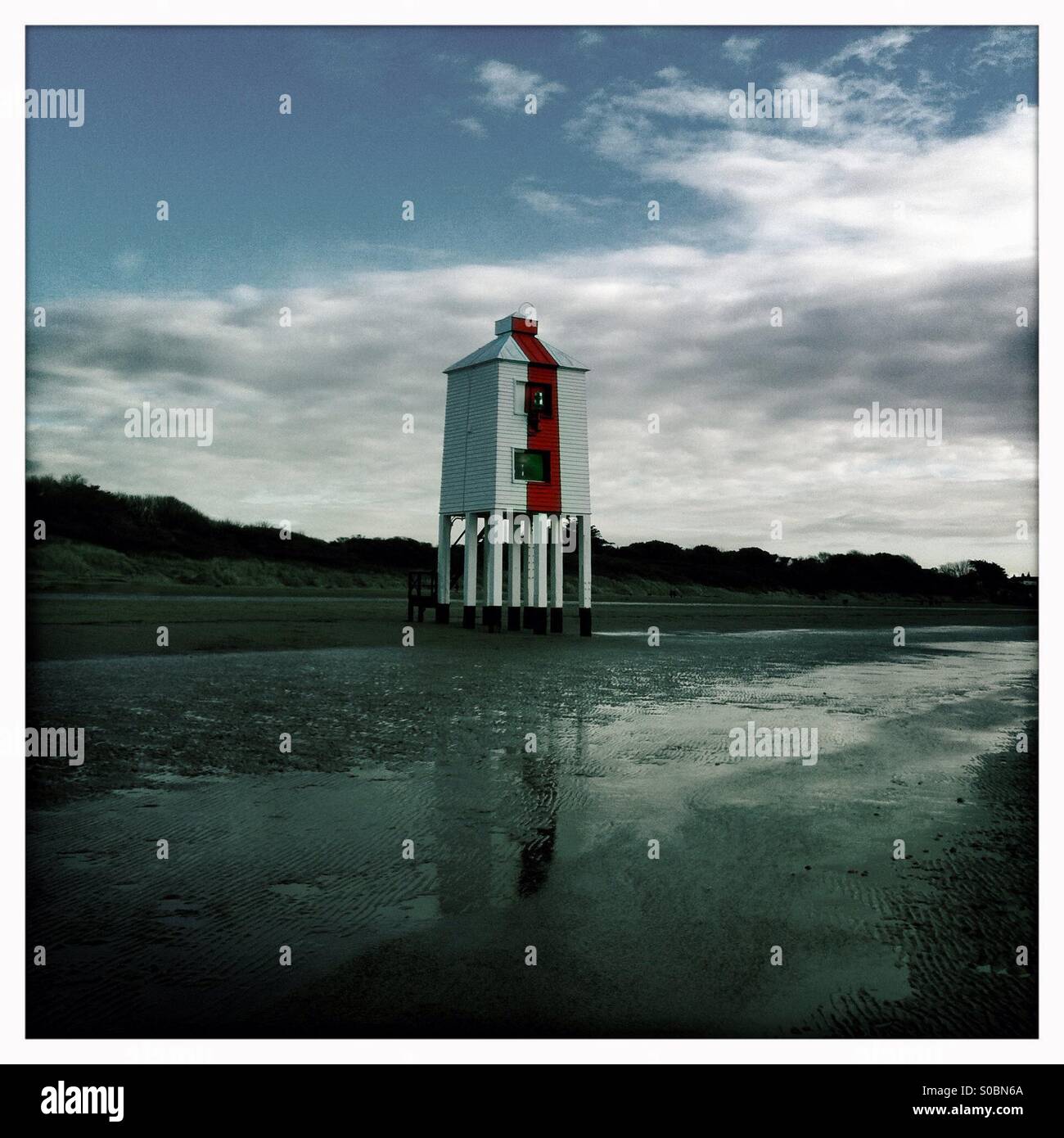 Lighthouse and reflection on wet beach at burnham-on-sea - Smartphone Captured Stock Image