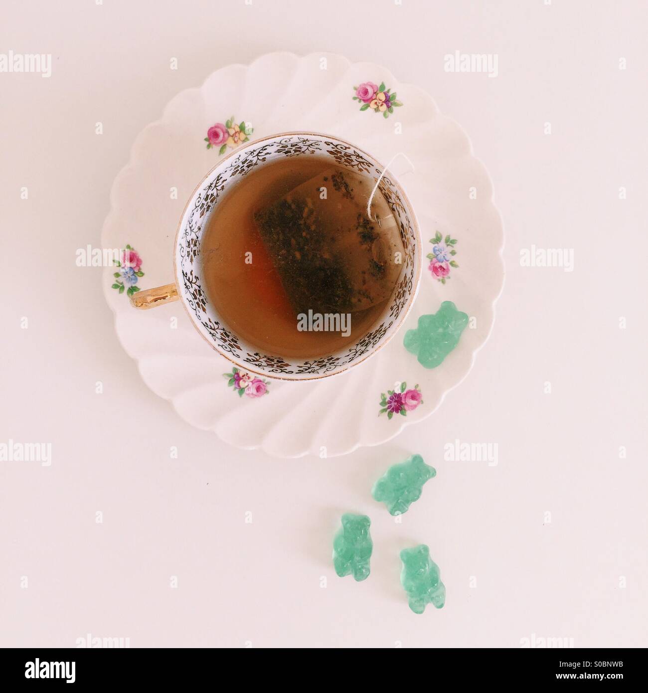 Tea and gummy bears Stock Photo