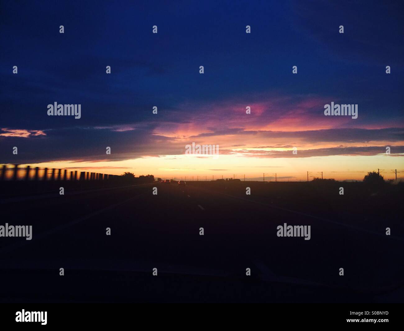 Sun going down Stock Photo Alamy