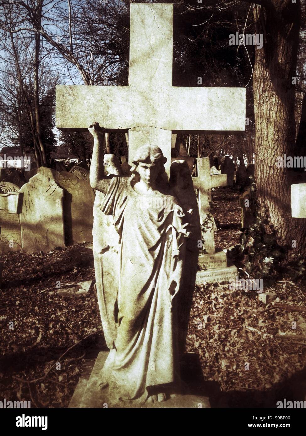 Angel sculpture on gravestone, Beckenham, Kent, UK - Smartphone Captured Stock Image