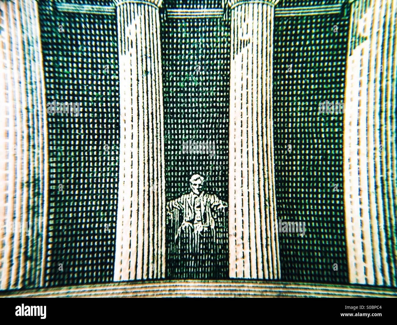 Macro view of the Lincoln Memorial on the back of a five dollar bill Stock Photo