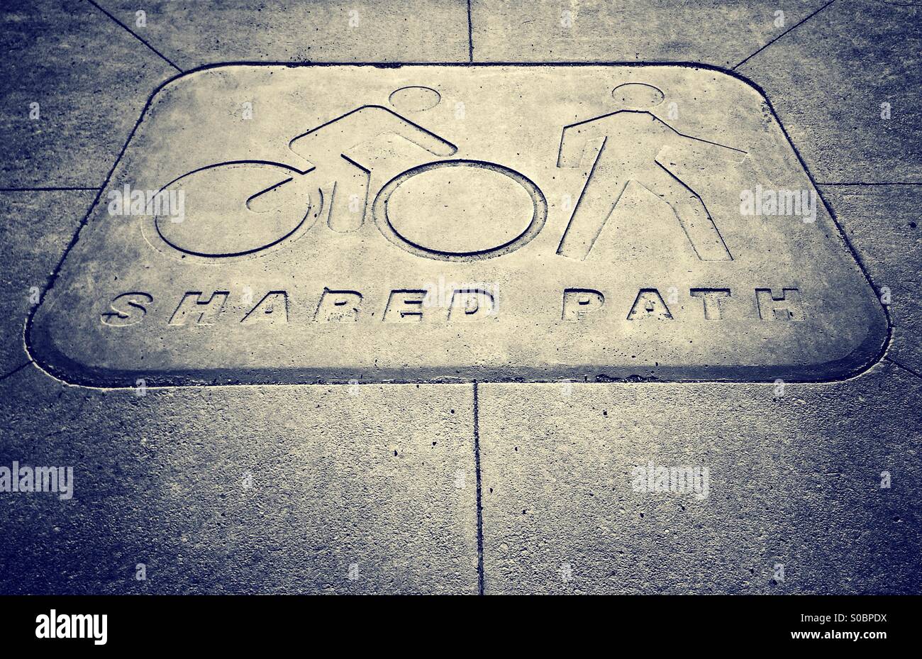 Sign indicating the path is to be shared by both cyclists and ...
