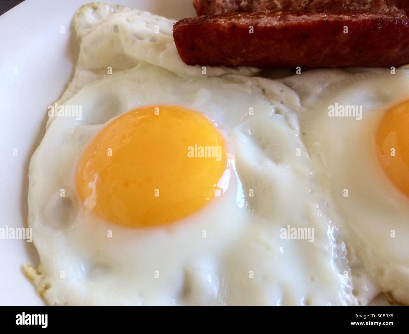 Breakfast eggs and sausage Stock Photo - Alamy