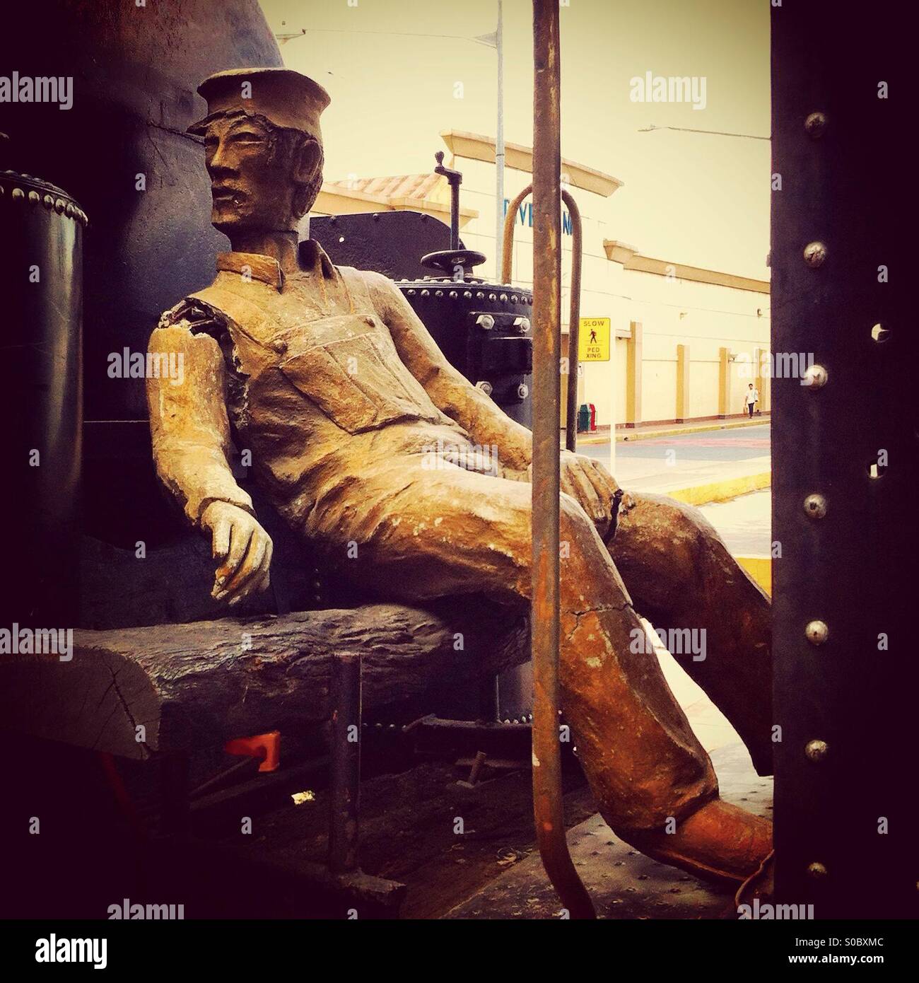 Broken statue of a train driver - Smartphone Captured Stock Image