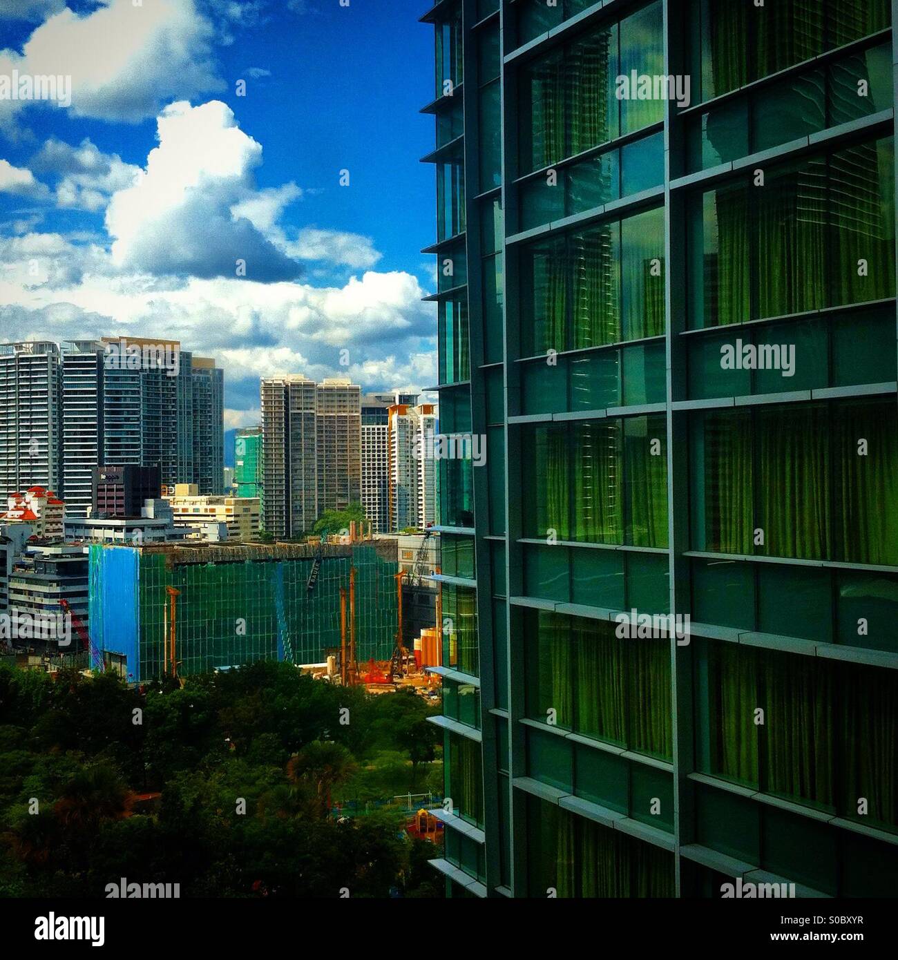 Detail of modern tower with Kuala Lampur in the background - Smartphone Captured Stock Image