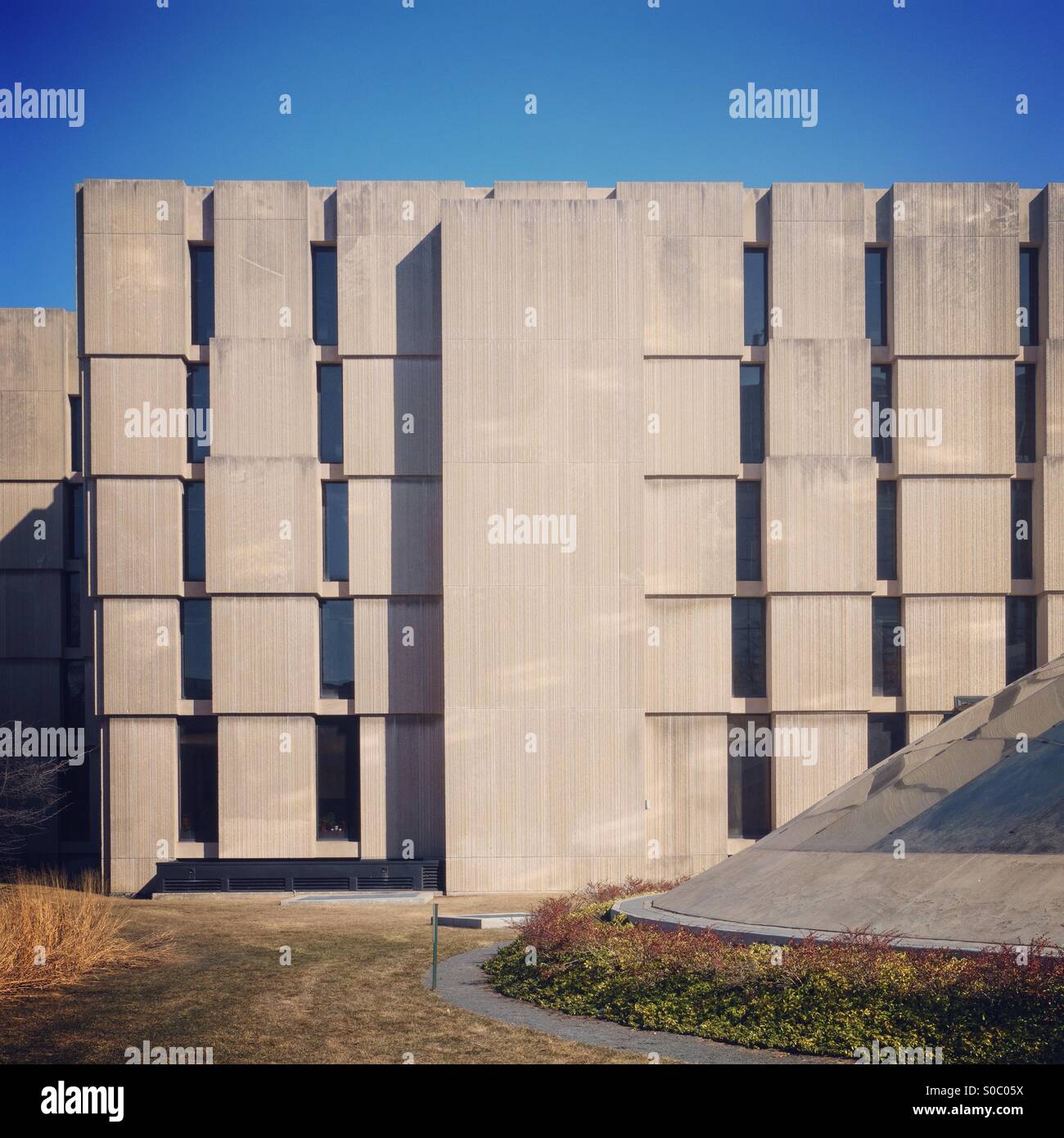 Regenstein Library brutalist concrete facade at the University of Chicago campus, Illinois, USA. - Smartphone Captured Stock Image