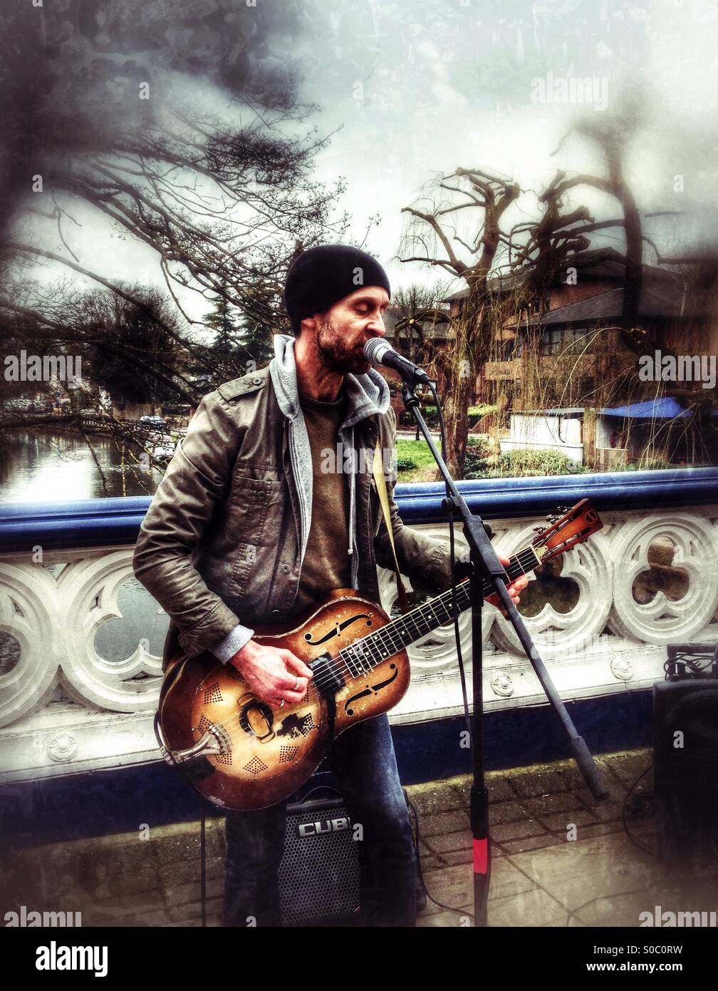 Billy Irvine busking in Guildford, Surrey, England. - Smartphone Captured Stock Image