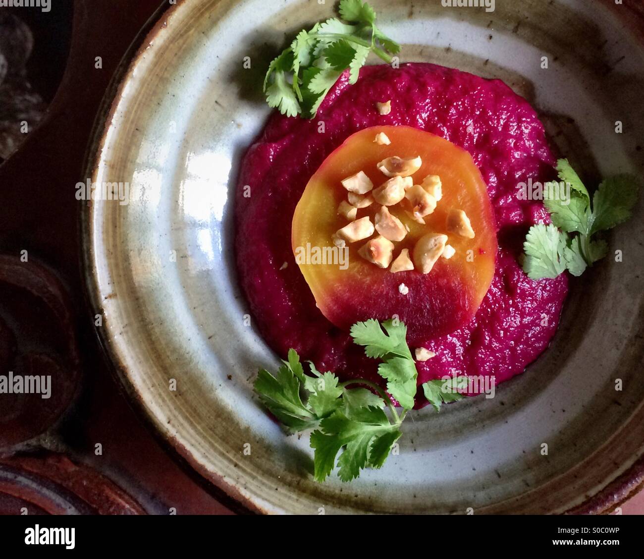 Beet meze spread with hazelnuts and cilantro, Israeli cuisine - Smartphone Captured Stock Image