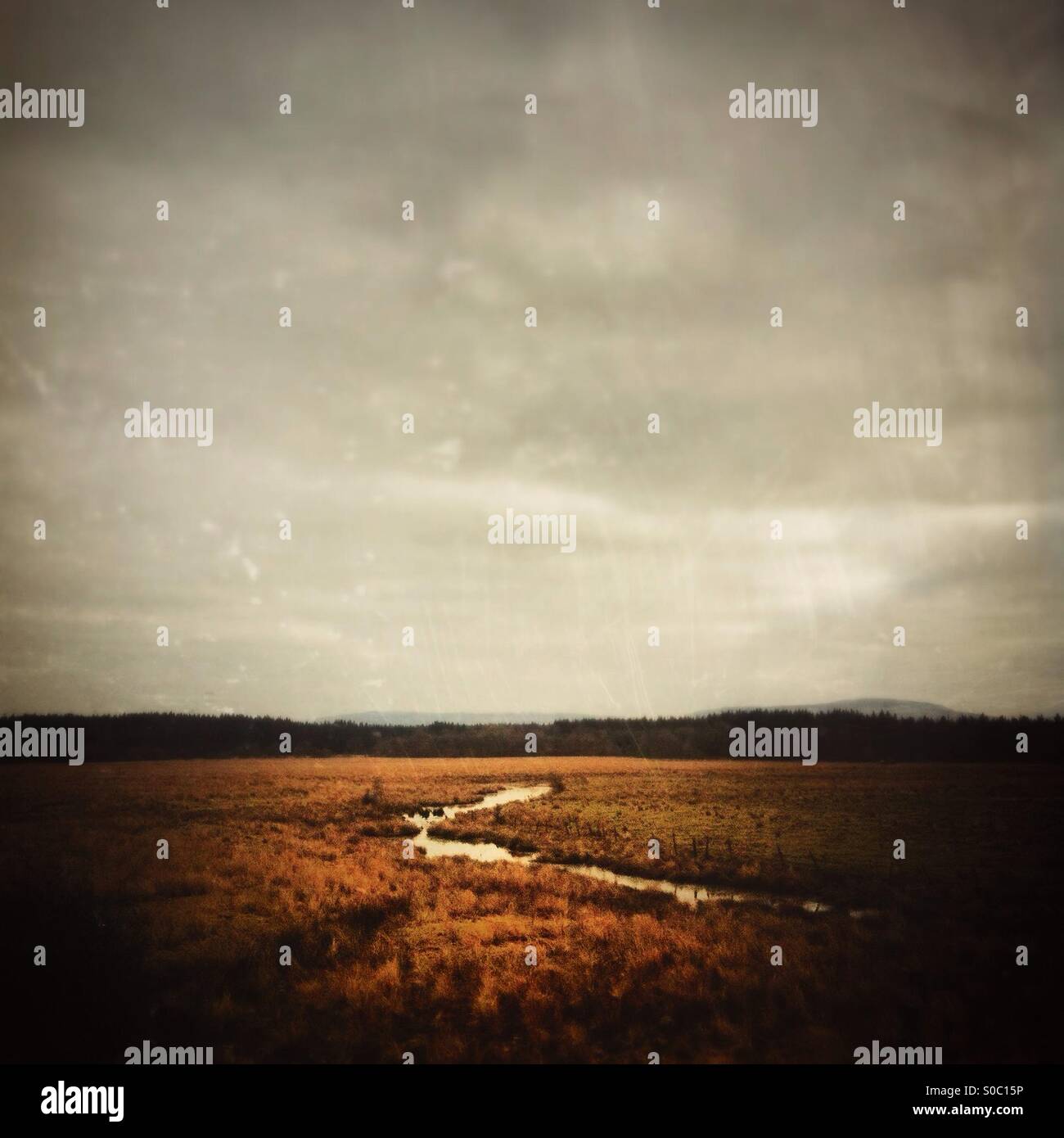 Scottish landscape with river and cloudy sky. - Smartphone Captured Stock Image