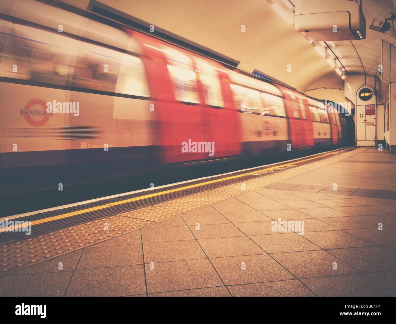Northern line London Underground train arriving at Embankment tube station Stock Photo