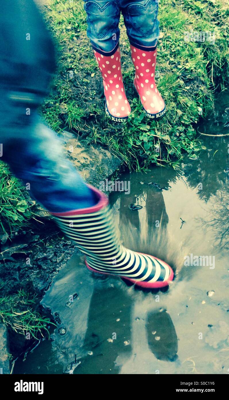 Children wearing Wellington boots Stock Photo - Alamy