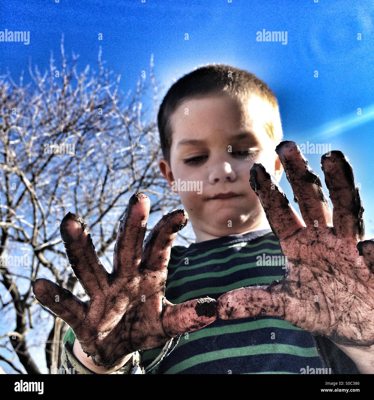 Mr. Muddy Hands Stock Photo
