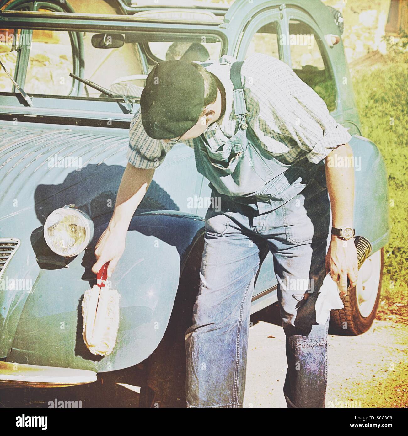 Clean the classic car - Smartphone Captured Stock Image