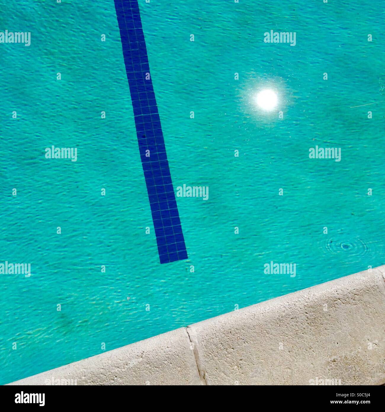 Reflection of sun, swimming pool, Bakersfield, California, March 2015 - Smartphone Captured Stock Image