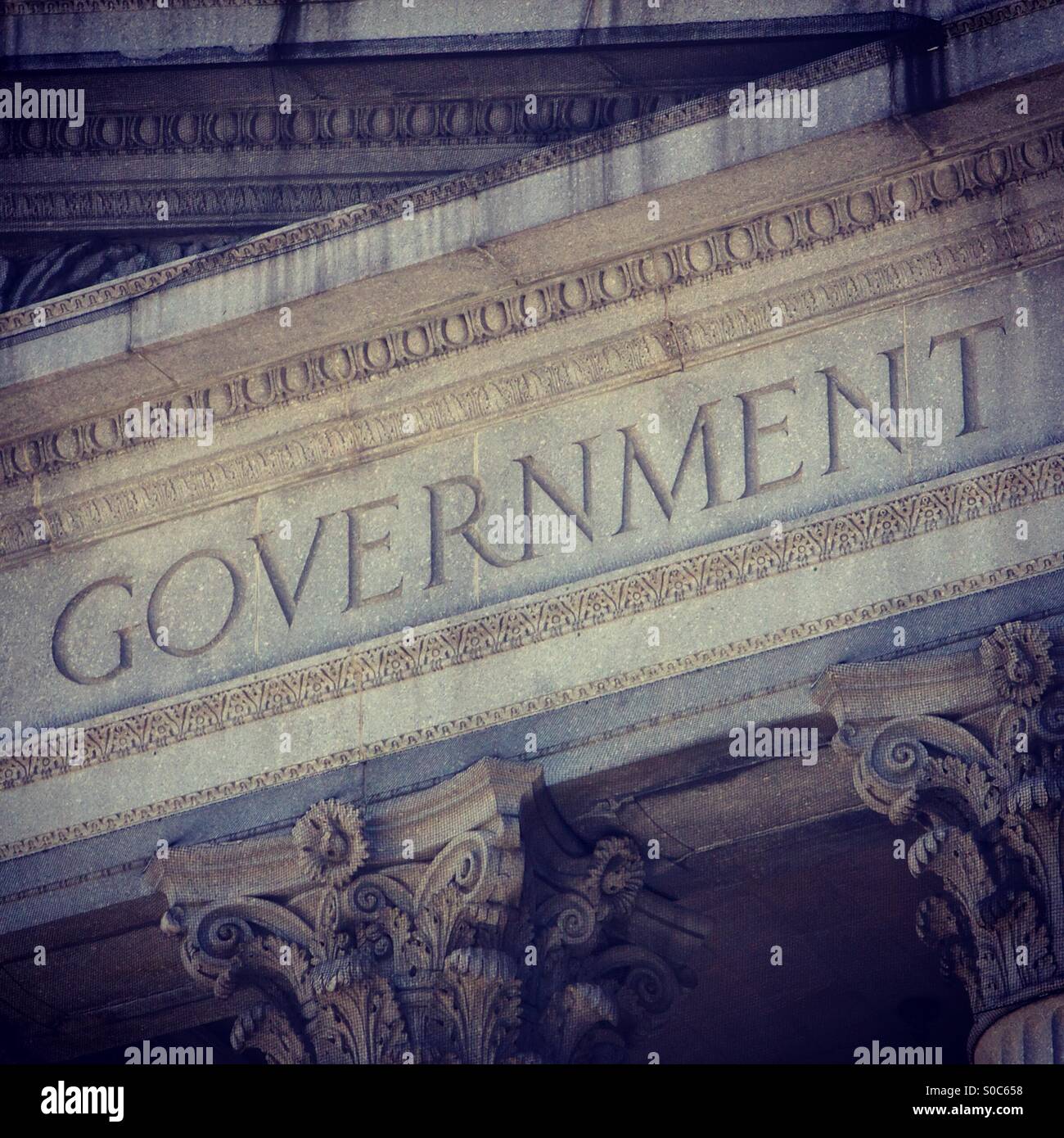 The word Government inscribed in stone on a neoclassical government building facade, architectural detail. - Smartphone Captured Stock Image