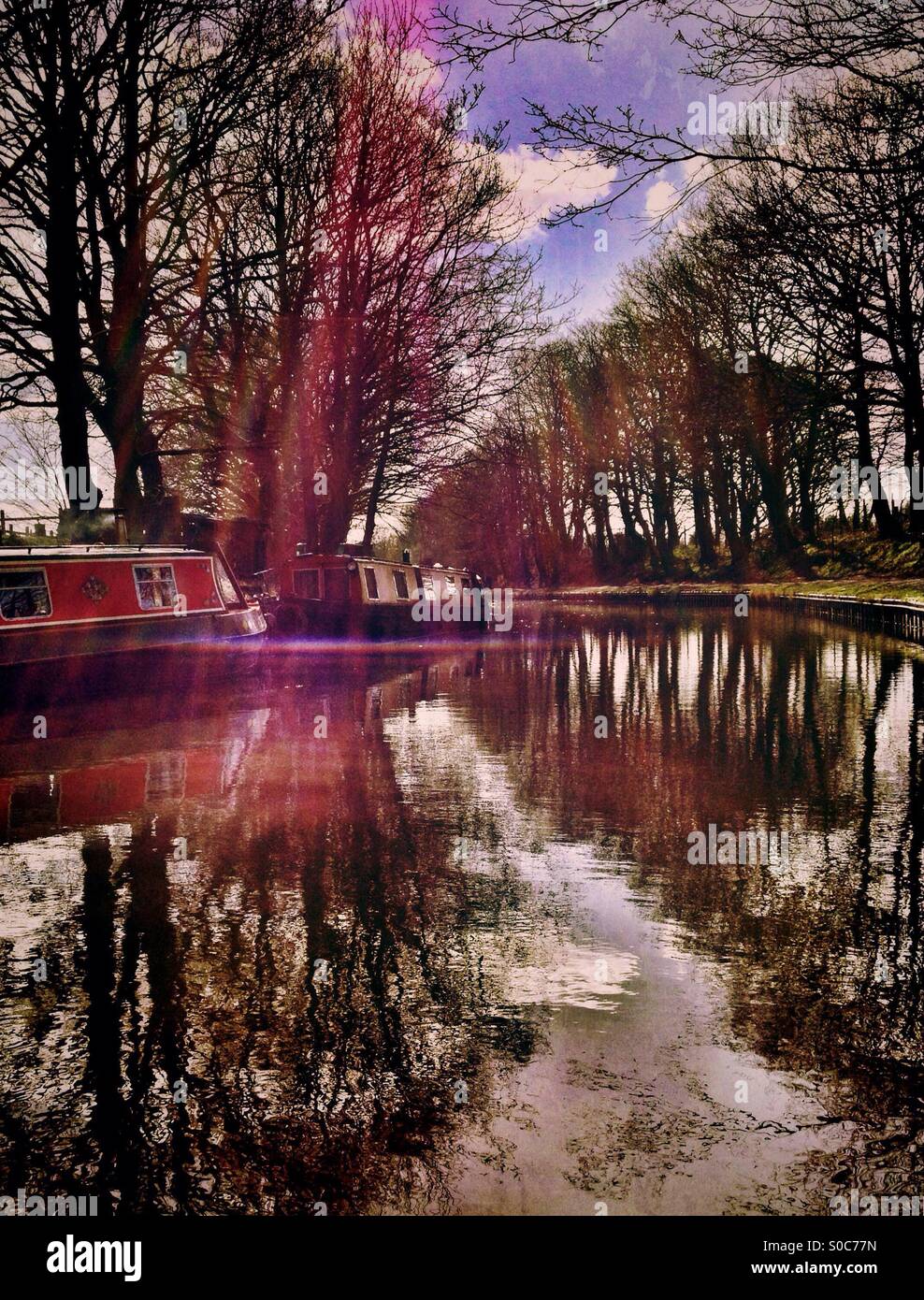 Narrow boats on Leeds and Liverpool canal near Chorley in Lancashire - Smartphone Captured Stock Image