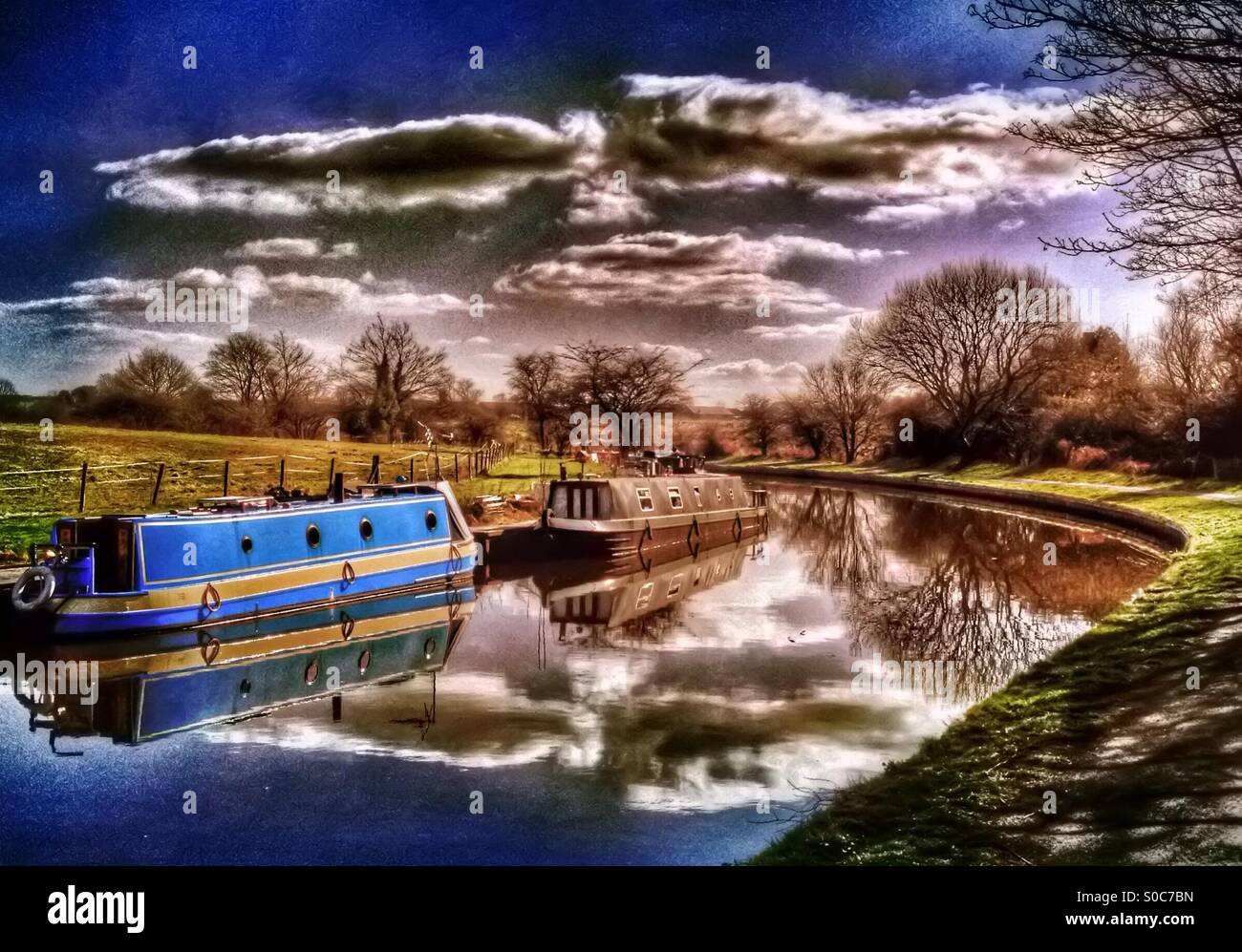 Narrow boats on Leeds and Liverpool canal near Chorley in Lancashire - Smartphone Captured Stock Image