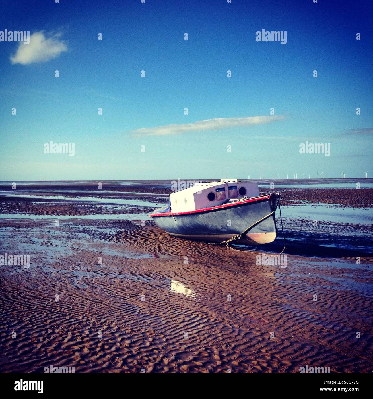 Stranded boat Stock Photo