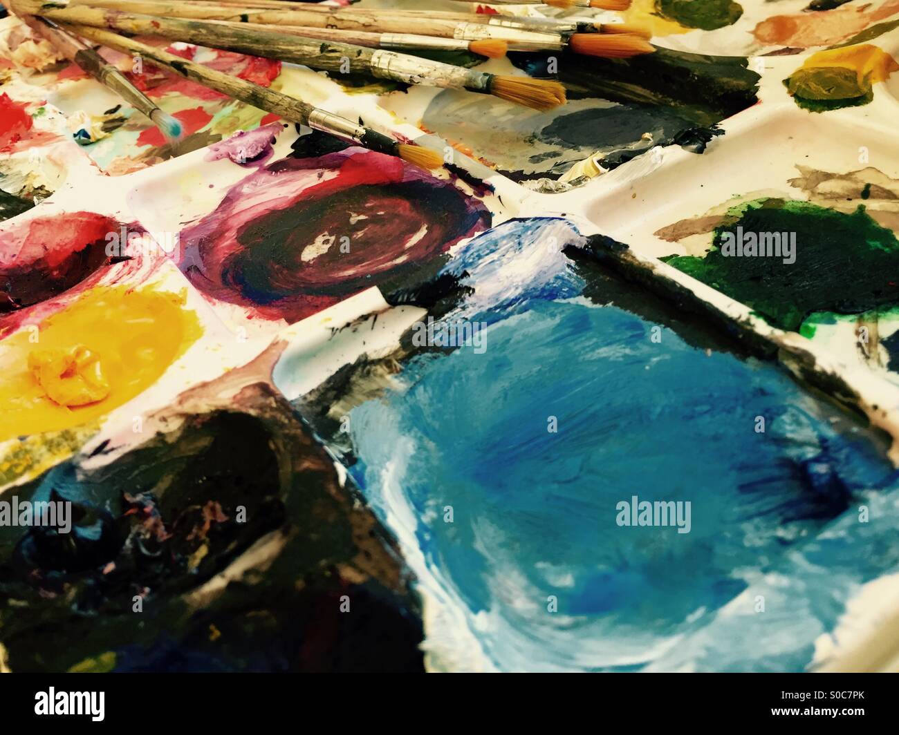 Colourful Paint Pallet And Brushed Colourful Paint Pallet And Brushed