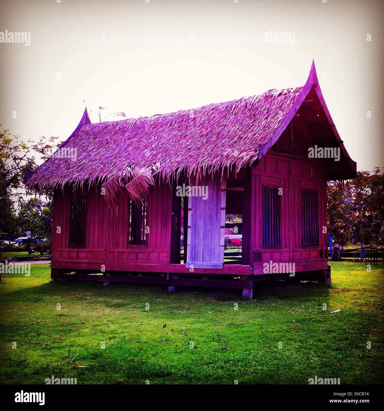 Thai wood house in a park - Smartphone Captured Stock Image