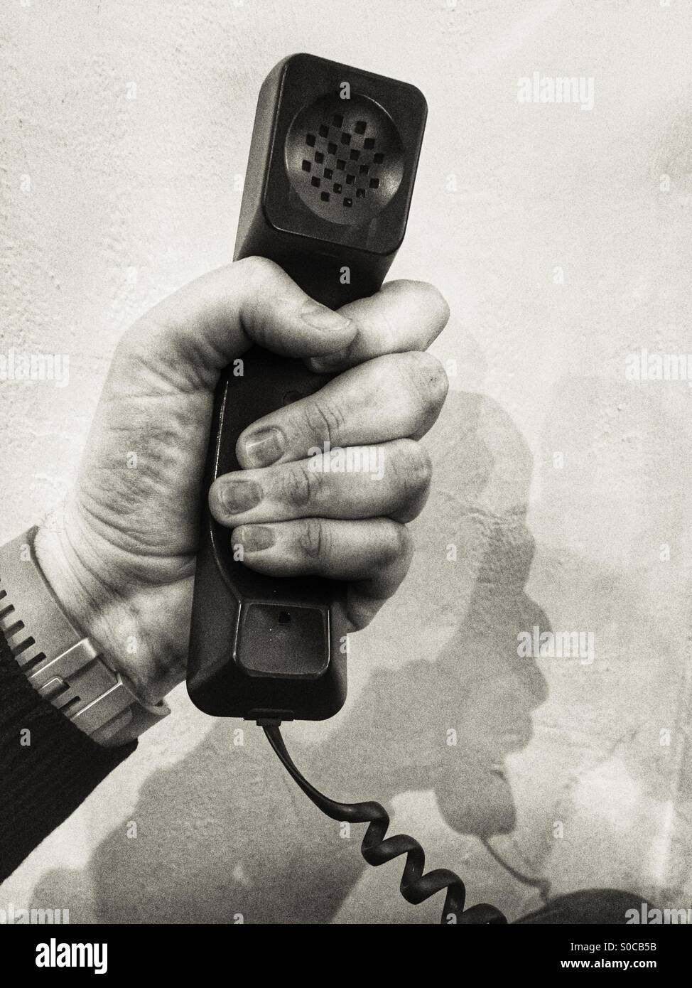 Hand with telephone Hand set Stock Photo Alamy
