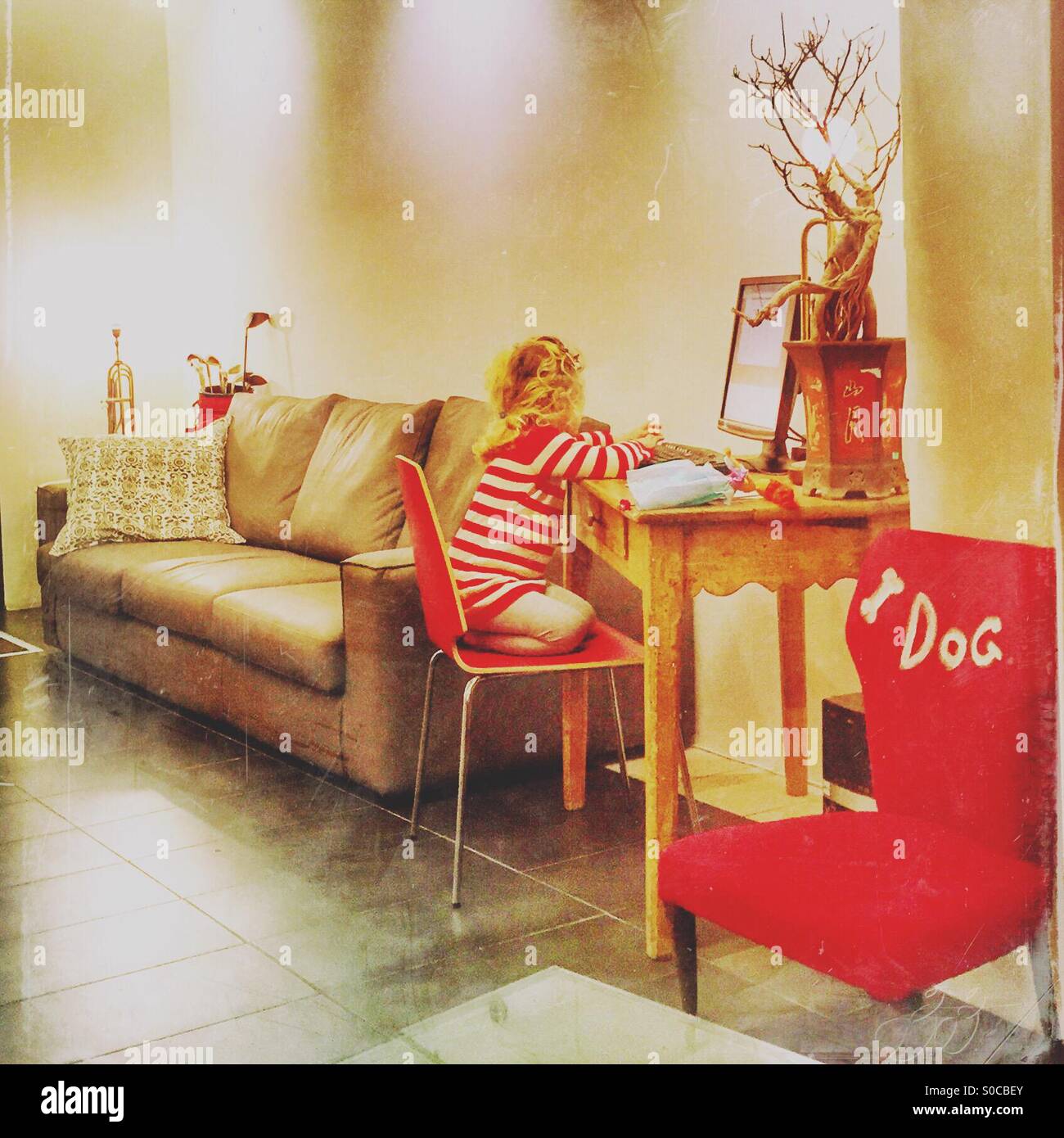 Girl at computer - Smartphone Captured Stock Image