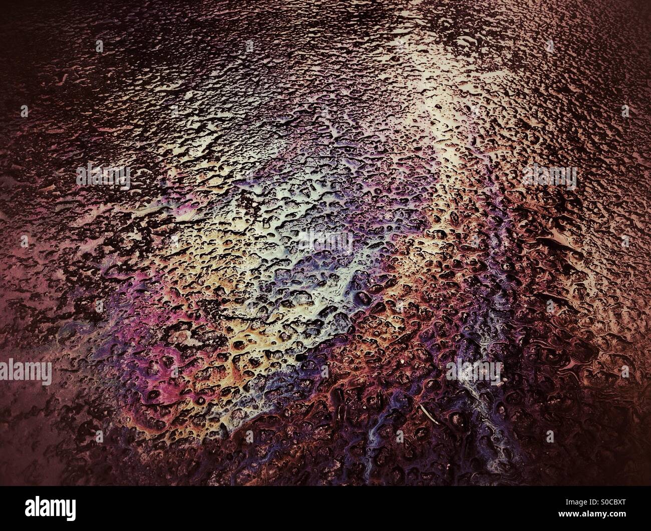 Oil spill on a driveway Stock Photo Alamy